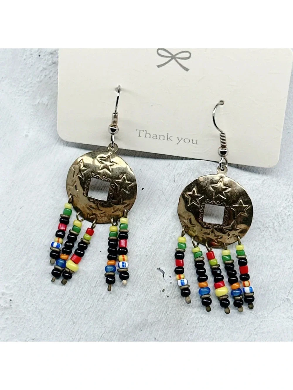 824mc. Goldtone Star Whimsigoth Earrings
